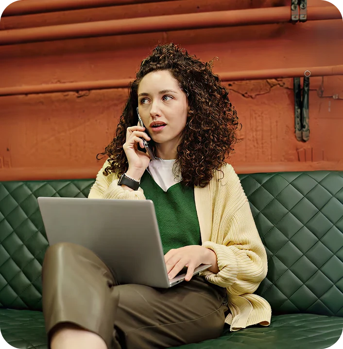 Woman ordering from a restaurant by phone
